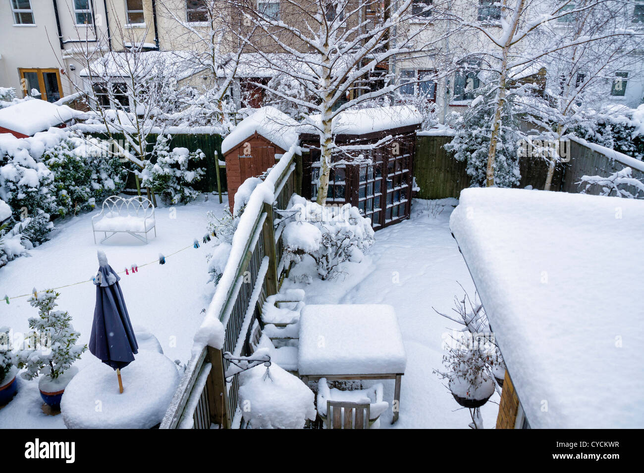 Suburbia - back yards after a heavy snow fall in Twickenham, England Stock Photo