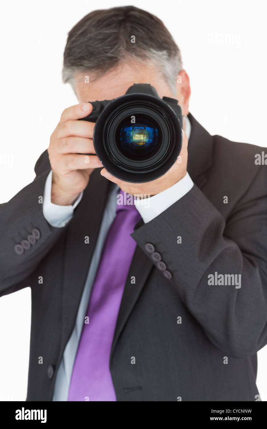 Businessman using digital camera Stock Photo - Alamy