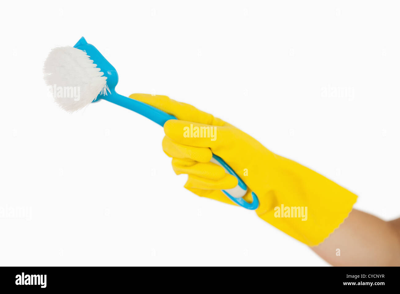 Female hand holding scrubbing brush Stock Photo Alamy