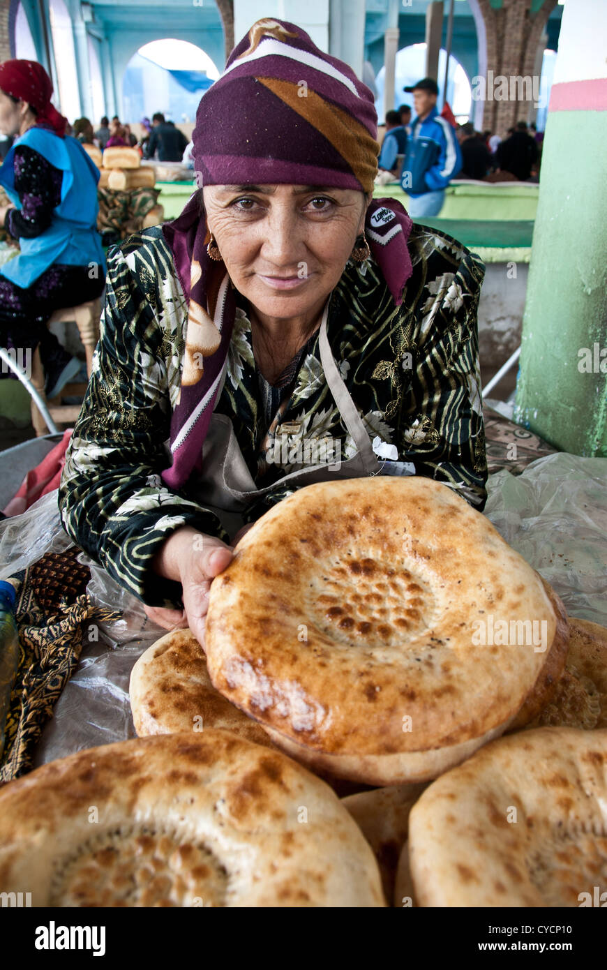 Traditional bread vendor in a market of  Samarkand, Uzbekistan Stock Photo