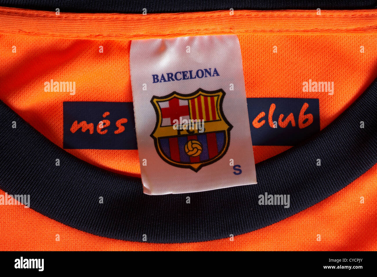 Barcelona FCB label in orange coloured football shirt Stock Photo