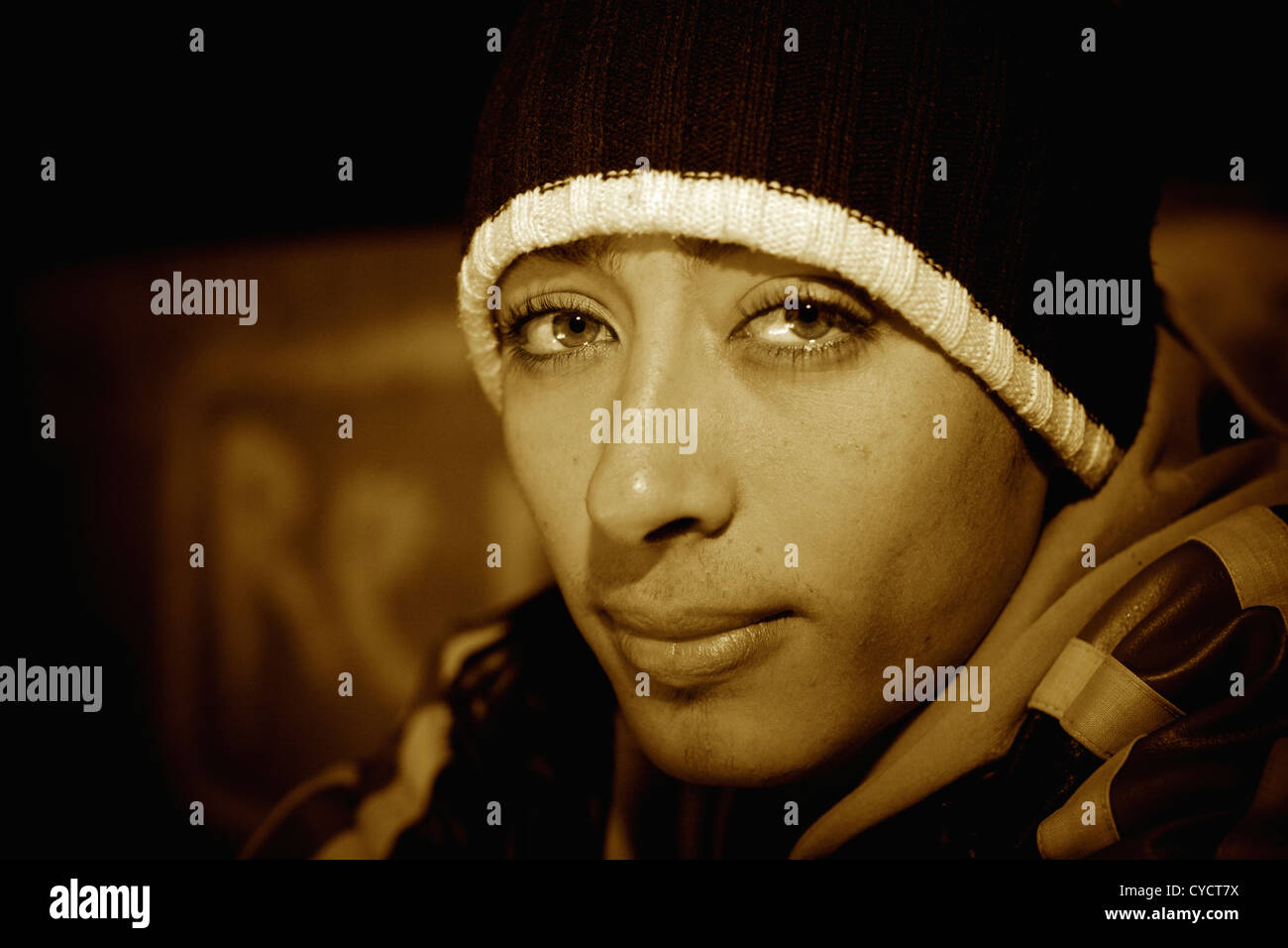 Egyptian boy with big eyes wearing a woolen hat. Stock Photo
