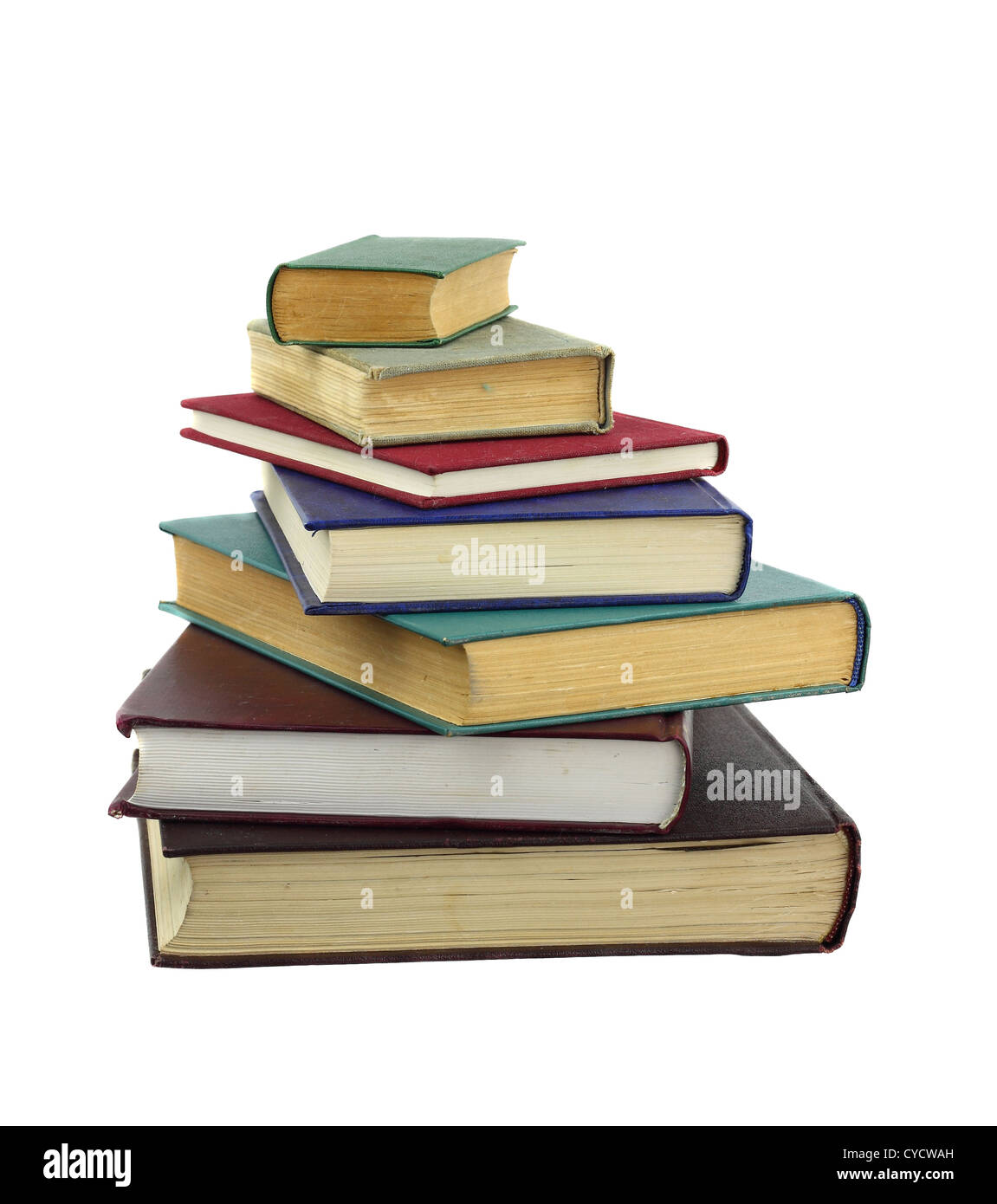 Books of different size in irregular stack isolated on white Stock Photo