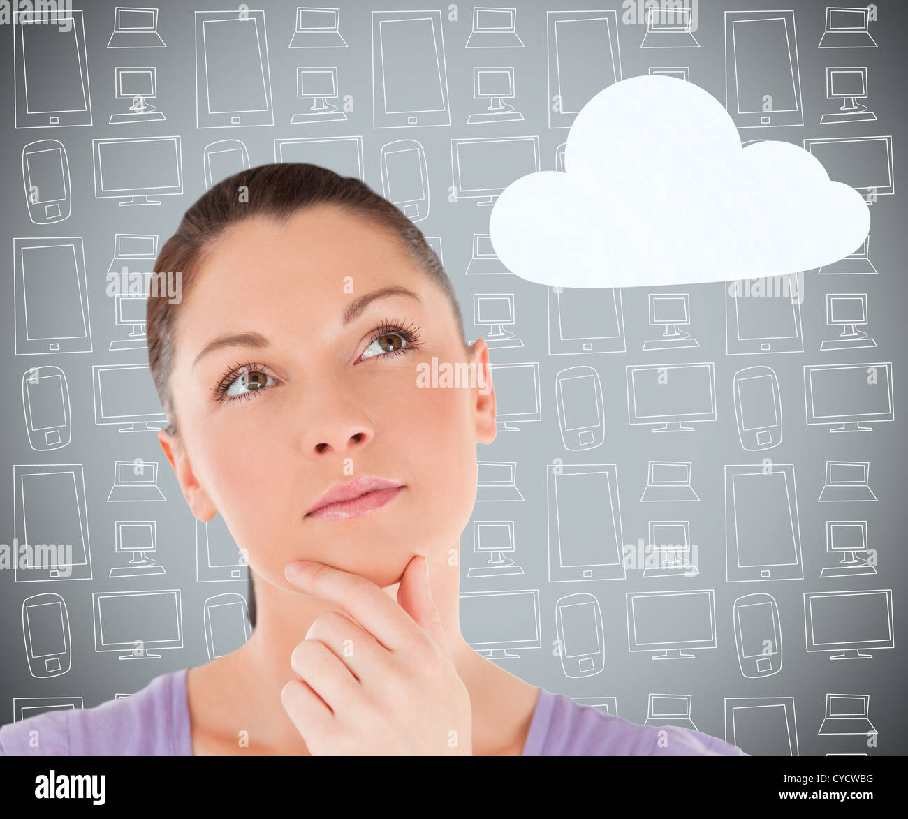 Brunette considering cloud computing Stock Photo