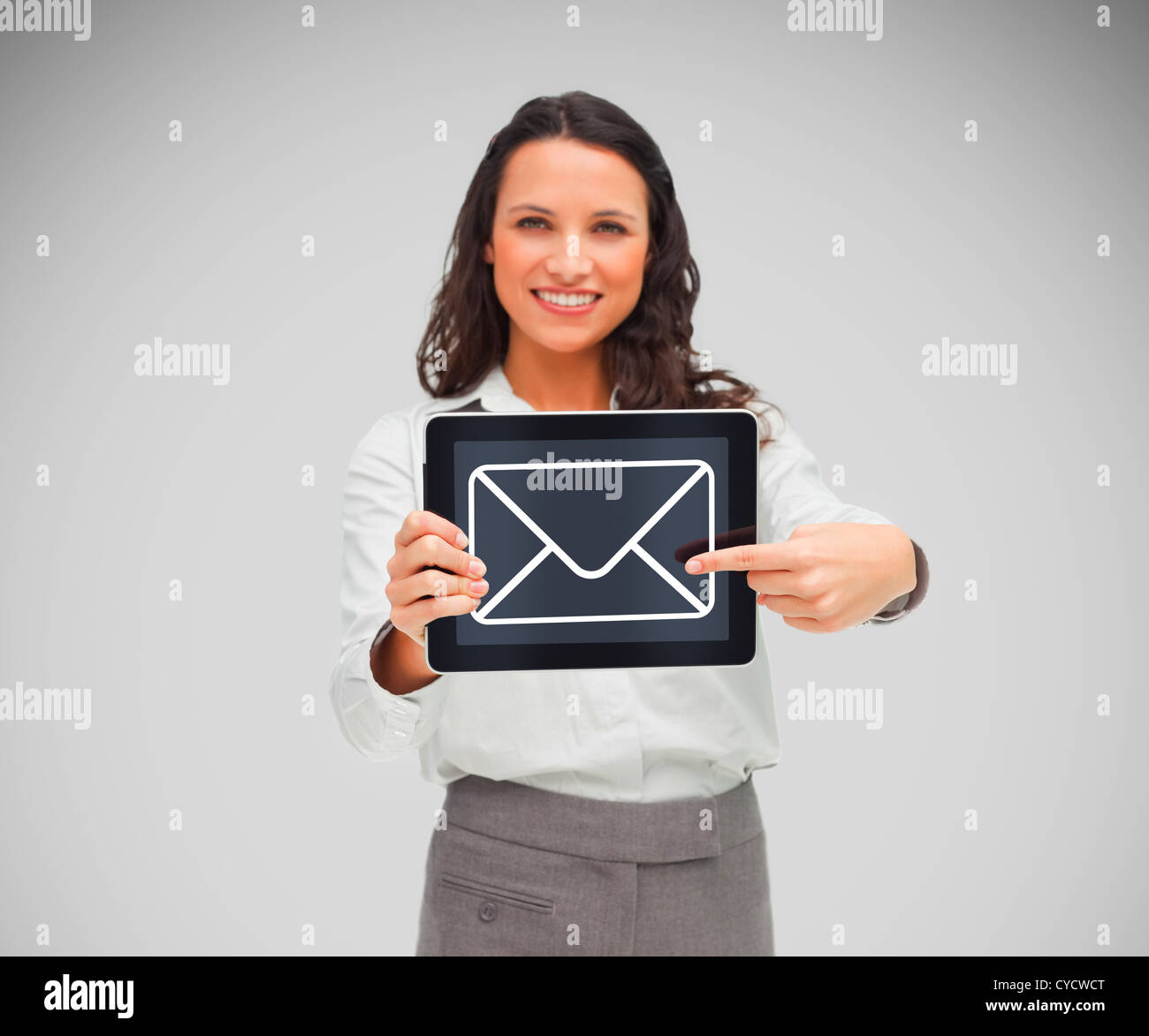 Woman holding a tablet pc smiling Stock Photo