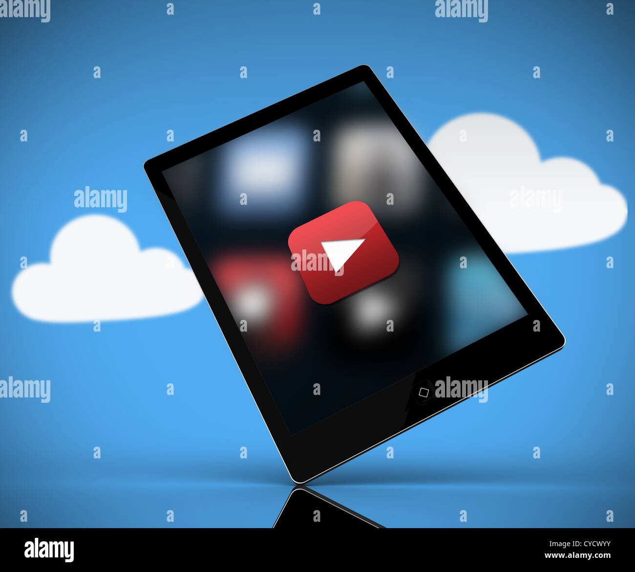 Tablet pc showing play button standing against background with clouds Stock Photo
