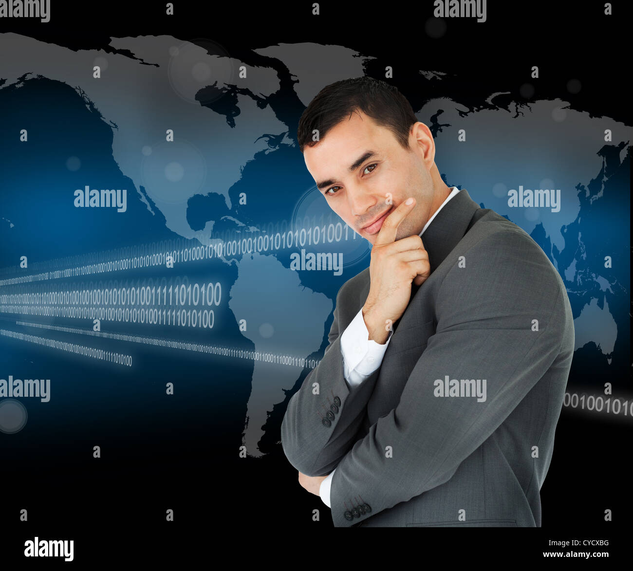 Businessman standing in front of world map Stock Photo