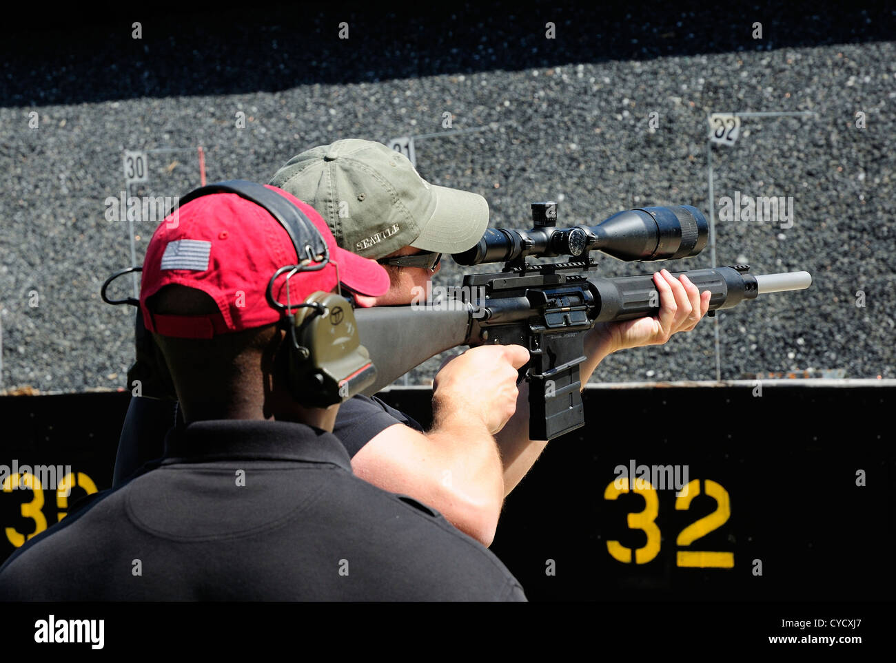 Gunman test firing automatic rifle at the FBI shooting range in Chicago
