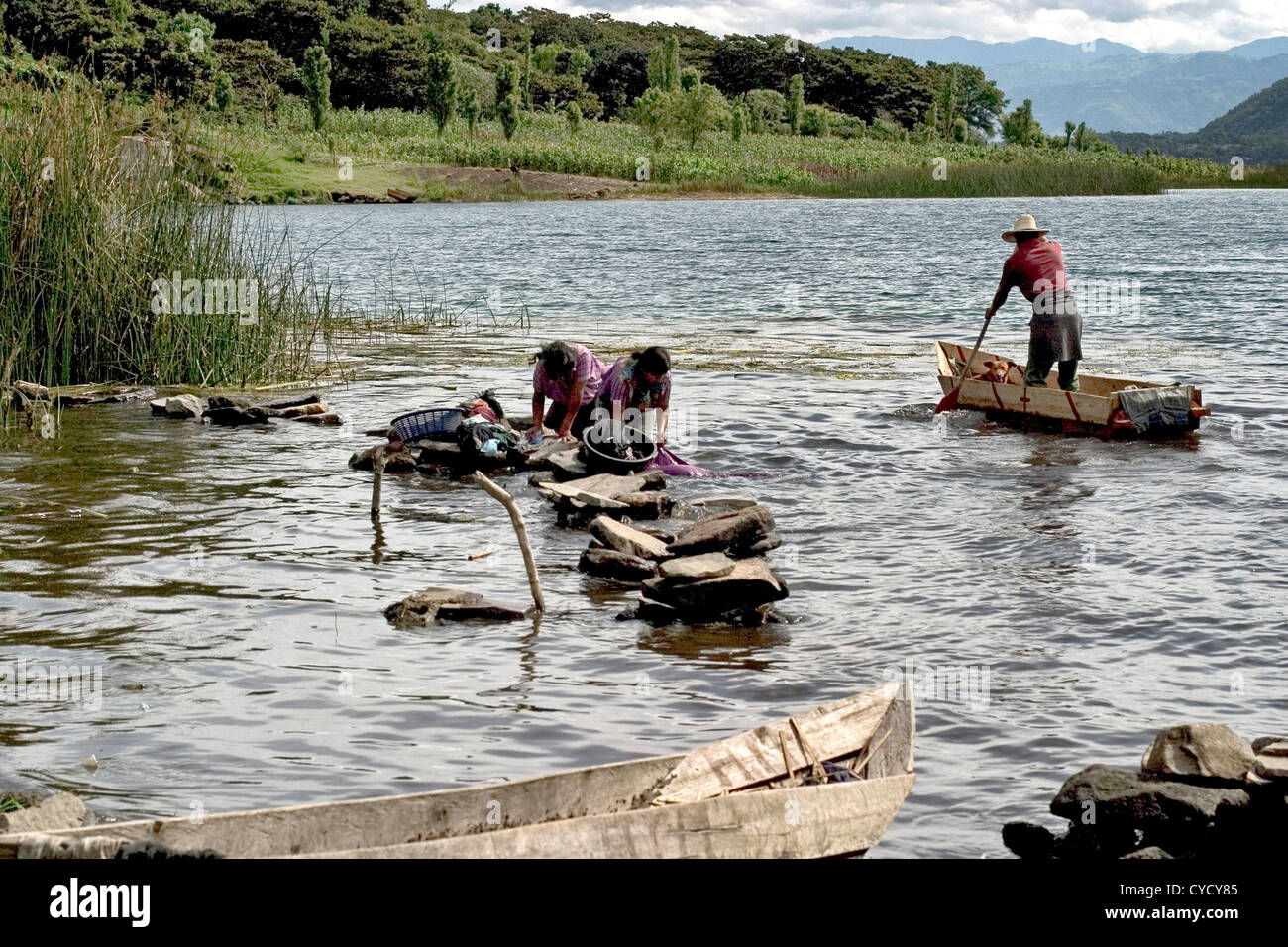 Women washing clothes on rocks hi-res stock photography and images - Alamy
