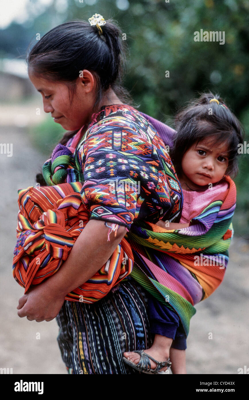 Guatemalan Mayan mother in traditional dress with baby ...
