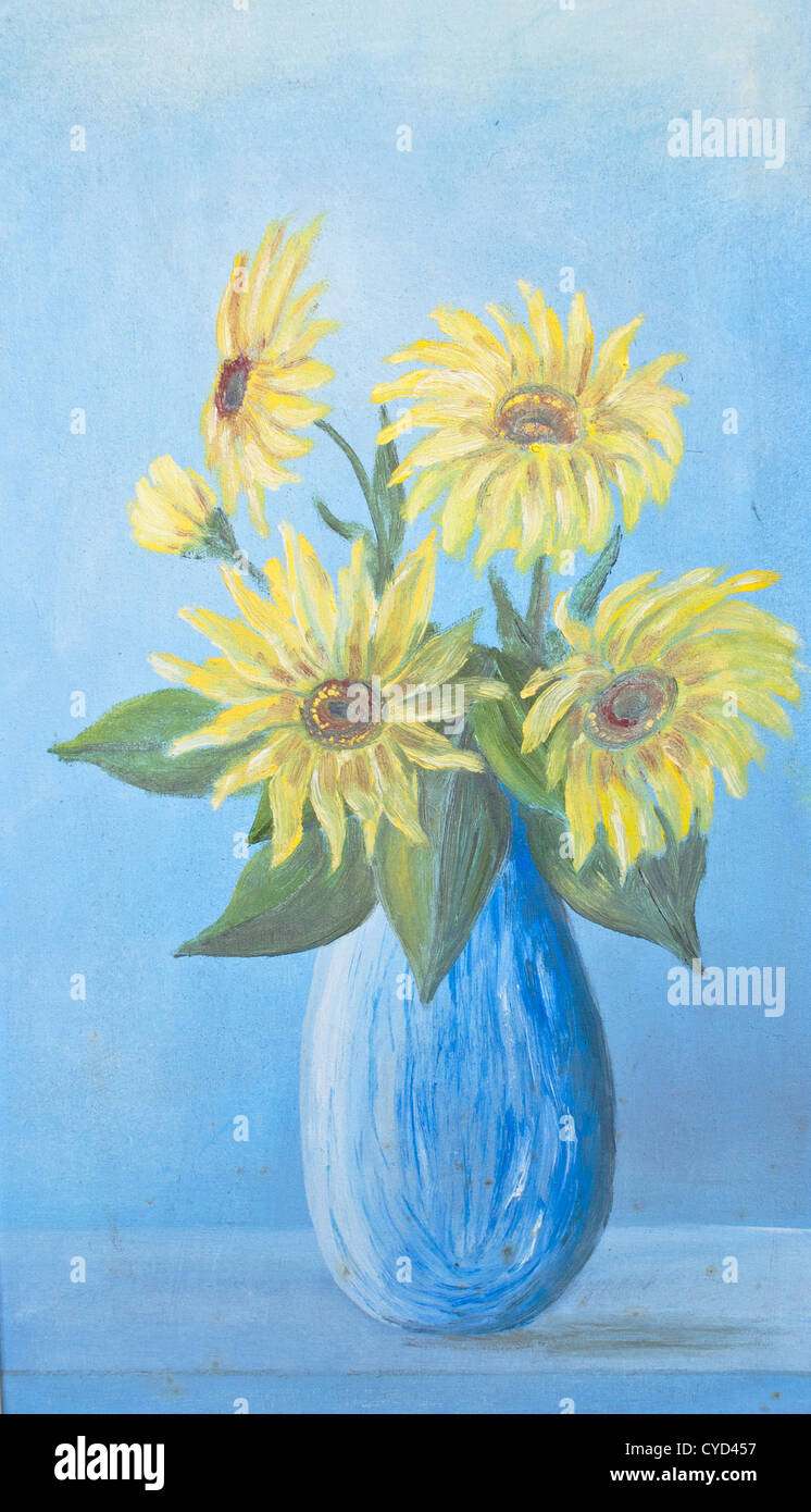 Lush bouquet of delicate sunflowers in blue vase on blue background ...