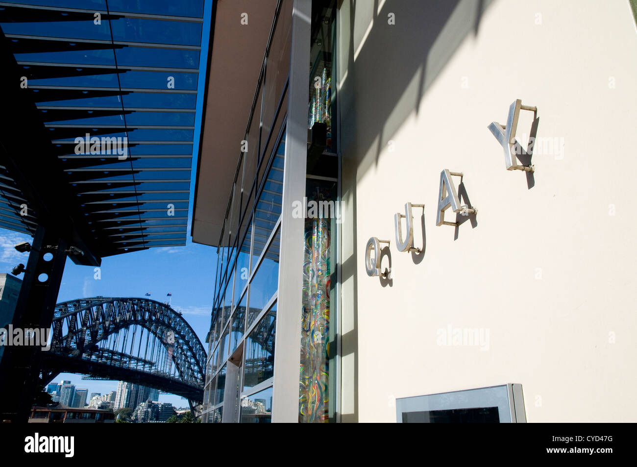 Facade of Quay Restaurant, Australia's most awarded restaurant Circular Quay, Sydney and the iconic Sydney Harbour Bridge behind - Australia Stock Photo