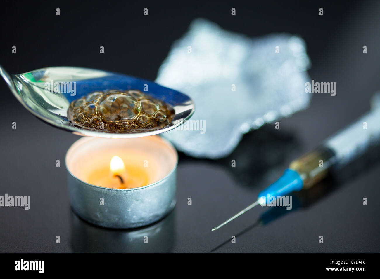 Cooking heroin Stock Photo