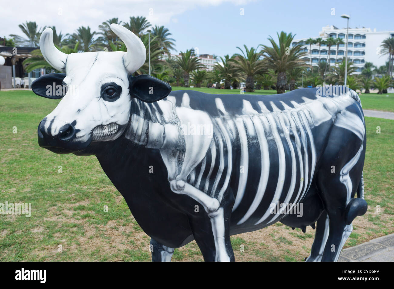 Cow statues painted in various guises on the promenade at Maspalomas, Gran Canaria, Canary Islands, Spain Stock Photo