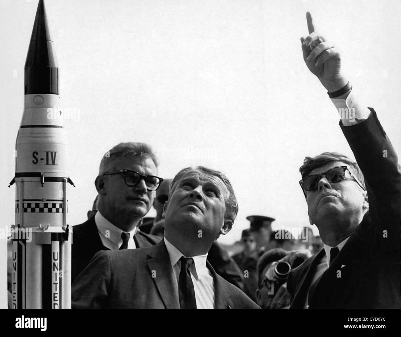 President John F. Kennedy, right, gets an explanation of the Saturn V launch system from Dr. Wernher von Braun at Cape Canaveral Stock Photo