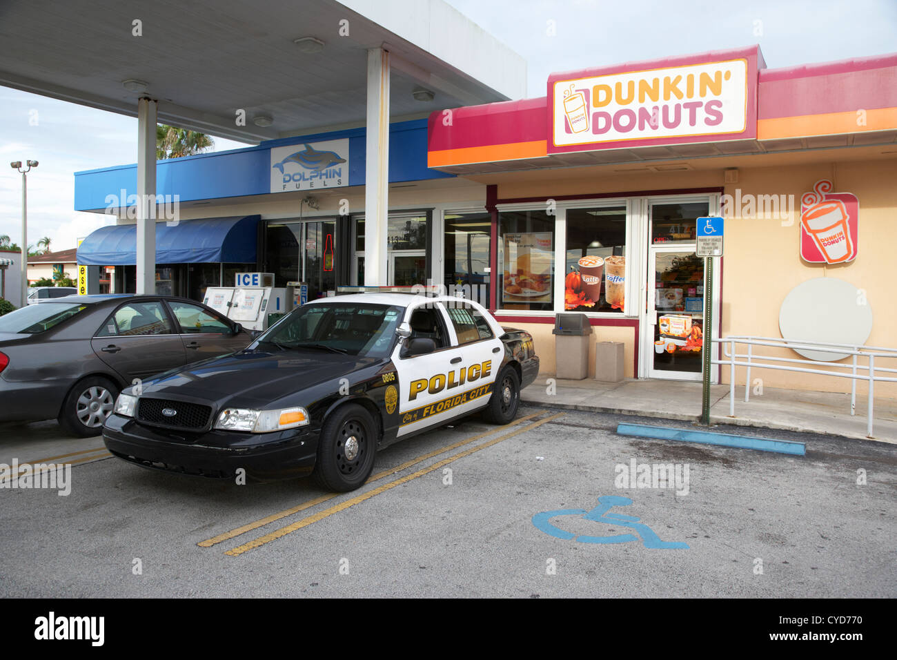 city of florida city police patrol squad car parked outside dunkin donuts shop usa Stock Photo