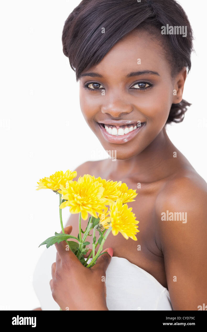 Young woman smiling holding yellow hi-res stock photography and images ...
