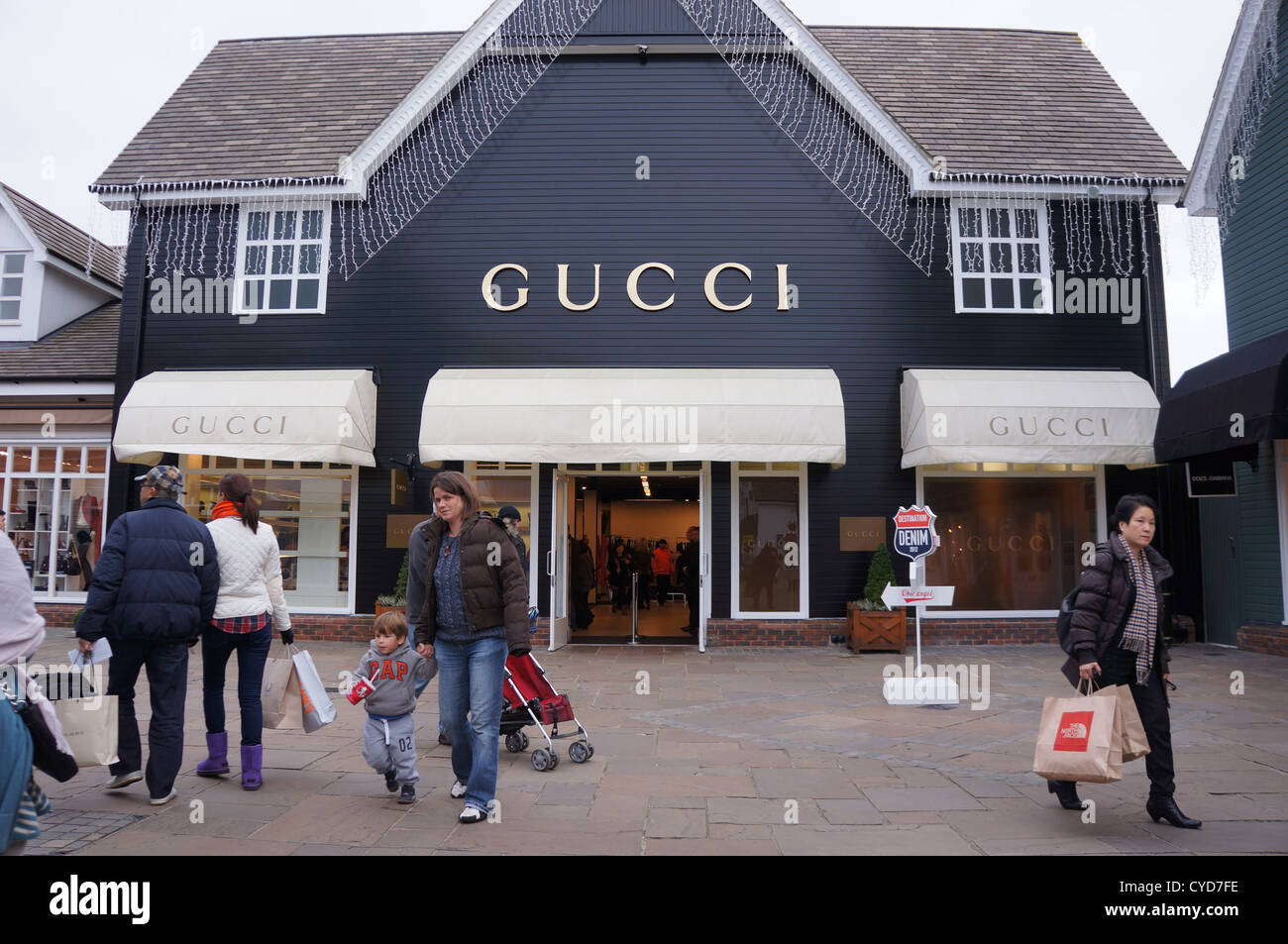 Gucci compnay shop at bicester village, uk Stock Photo - Alamy