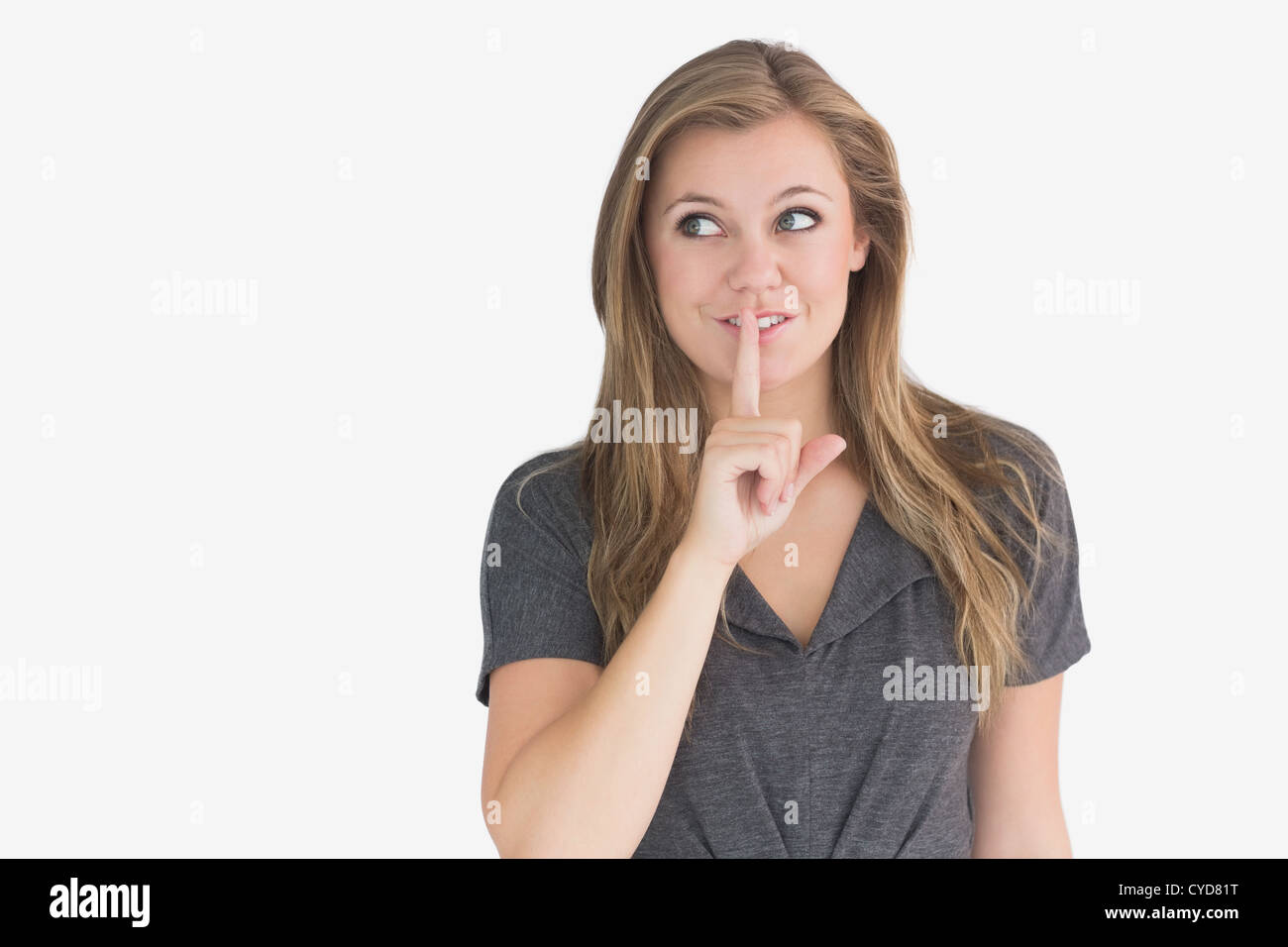 Woman making quiet sign Stock Photo