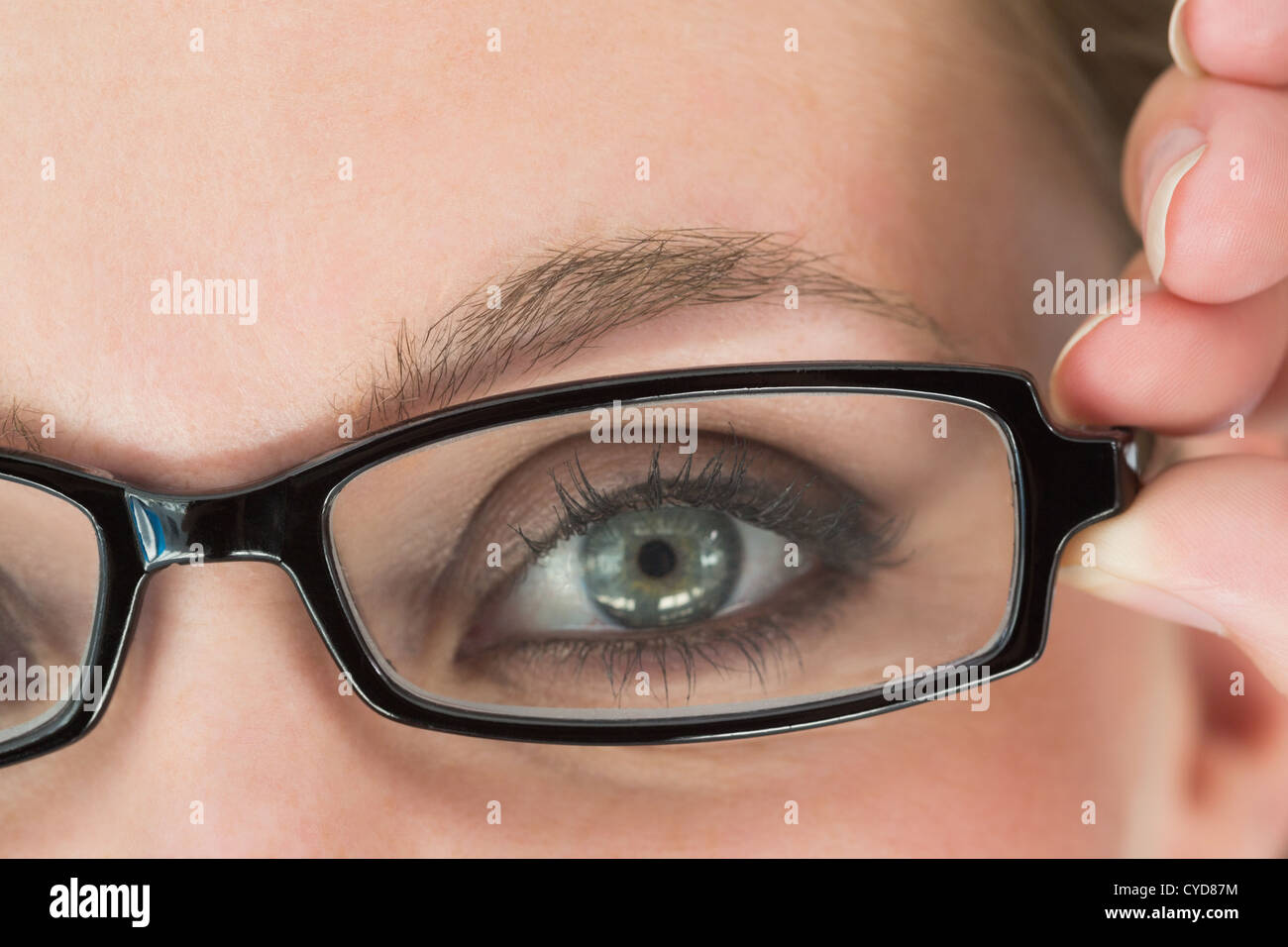 Green eyed woman with glasses Stock Photo