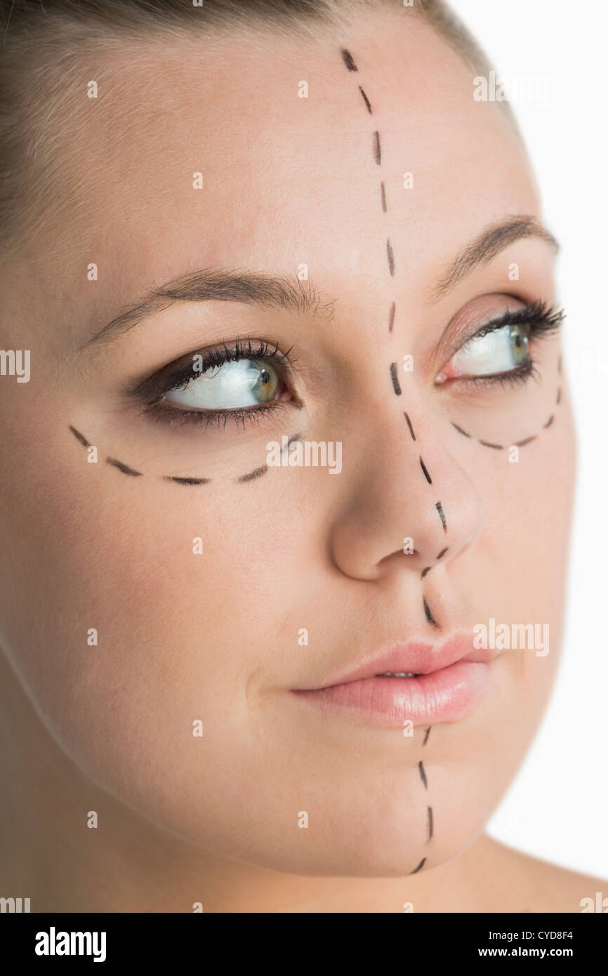 Blonde with marker on her face for facelift Stock Photo