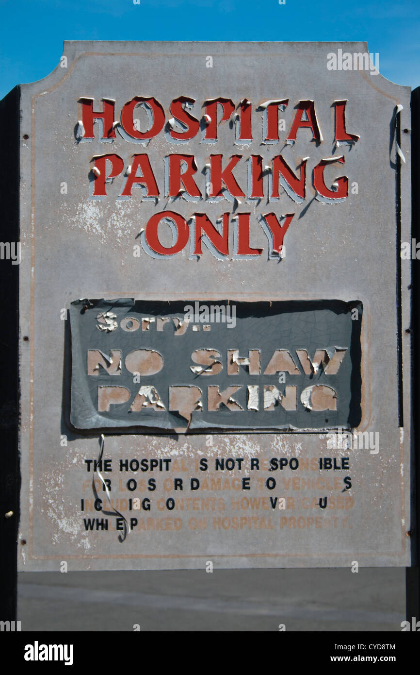 Decrepit Hospital Parking Only Sign With Peeling Letters Stock Photo 