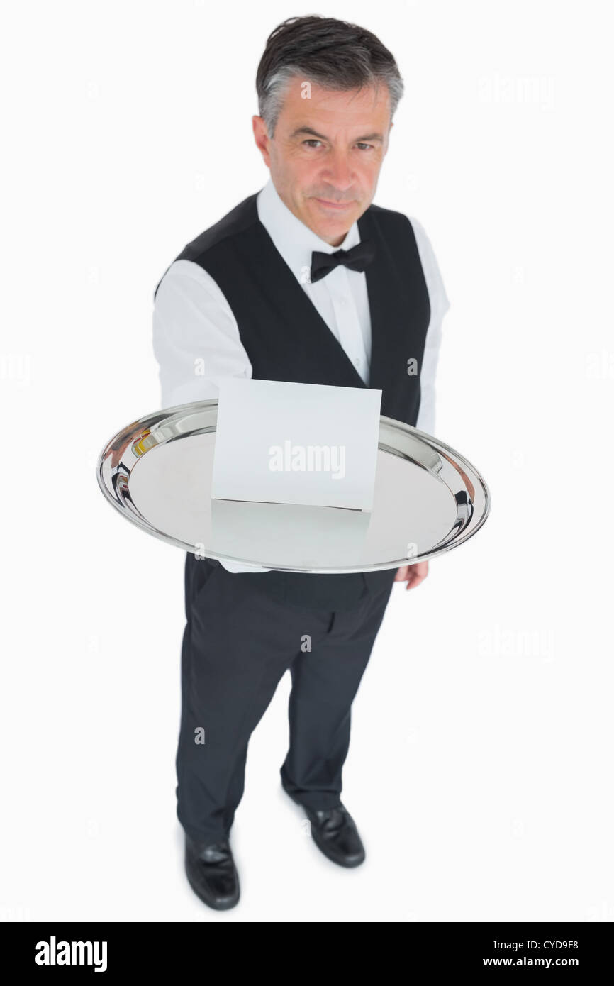 Waiter carrying silver tray hi-res stock photography and images - Alamy