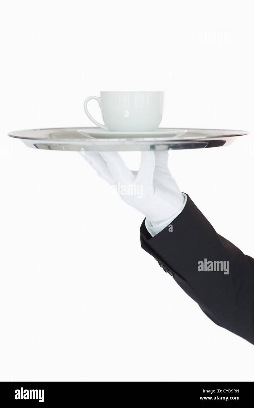 Cup of coffee on a silver tray Stock Photo