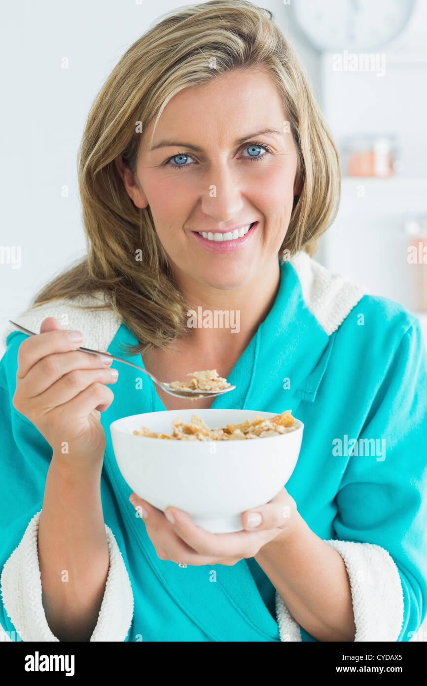 Woman eating cereals Stock Photo