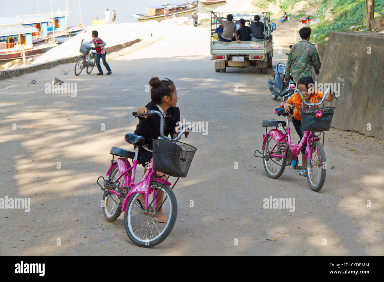 Girls with Bicycle in Luang Prabang, Laos Stock Photo Alamy