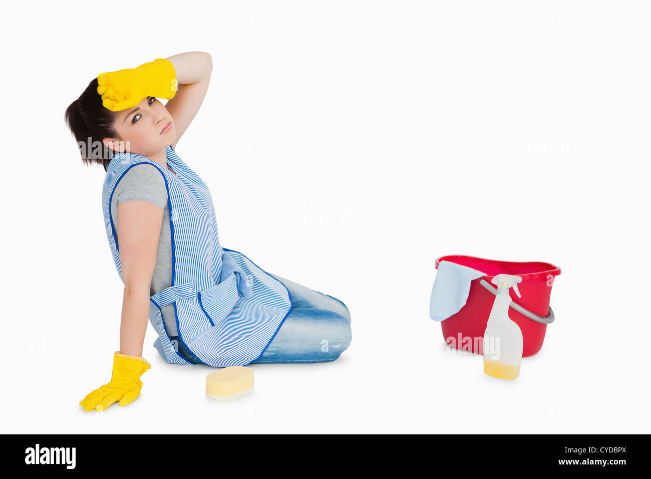 Exhausted woman cleaning the floor Stock Photo