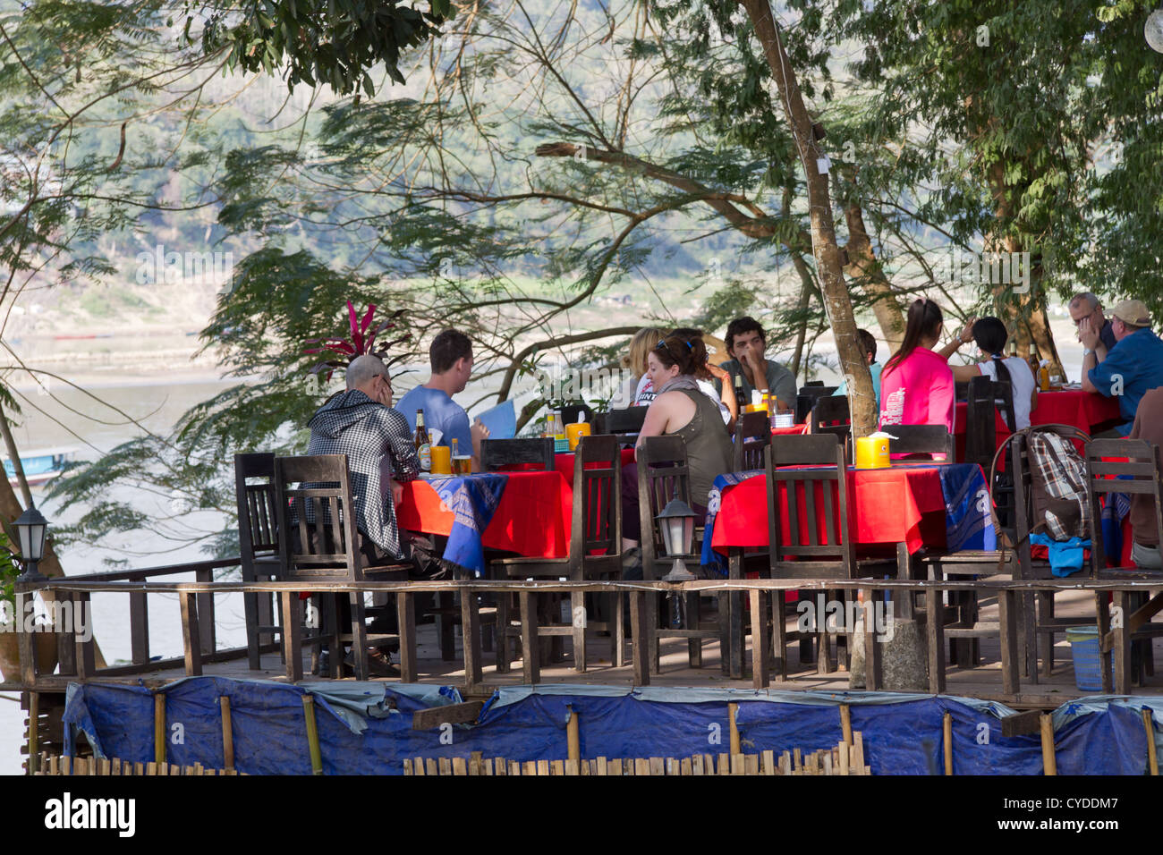 Restaurant on the Banks of the River Mekong in Luang Prabang, Laos Stock Photo