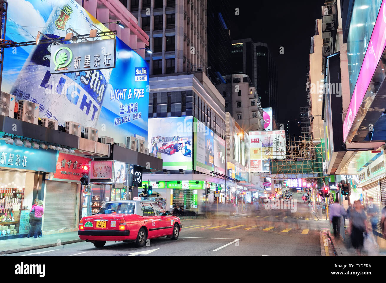 Crowded street view at night Stock Photo - Alamy