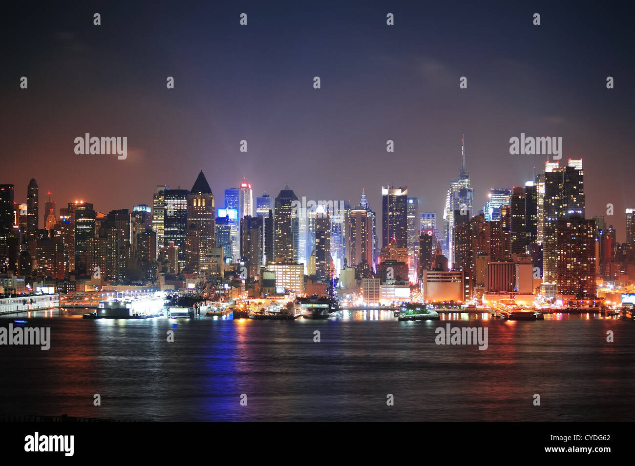 New York City Manhattan midtown skyline at night with skyscrapers lit ...