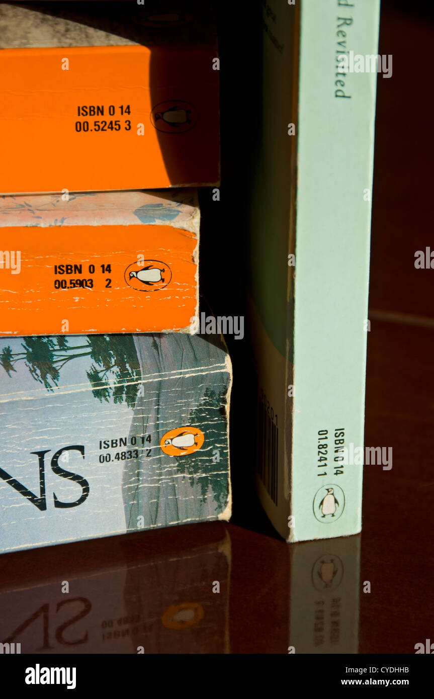 Close up of stack pile of Penguin books paperback reading fiction book on a table Stock Photo