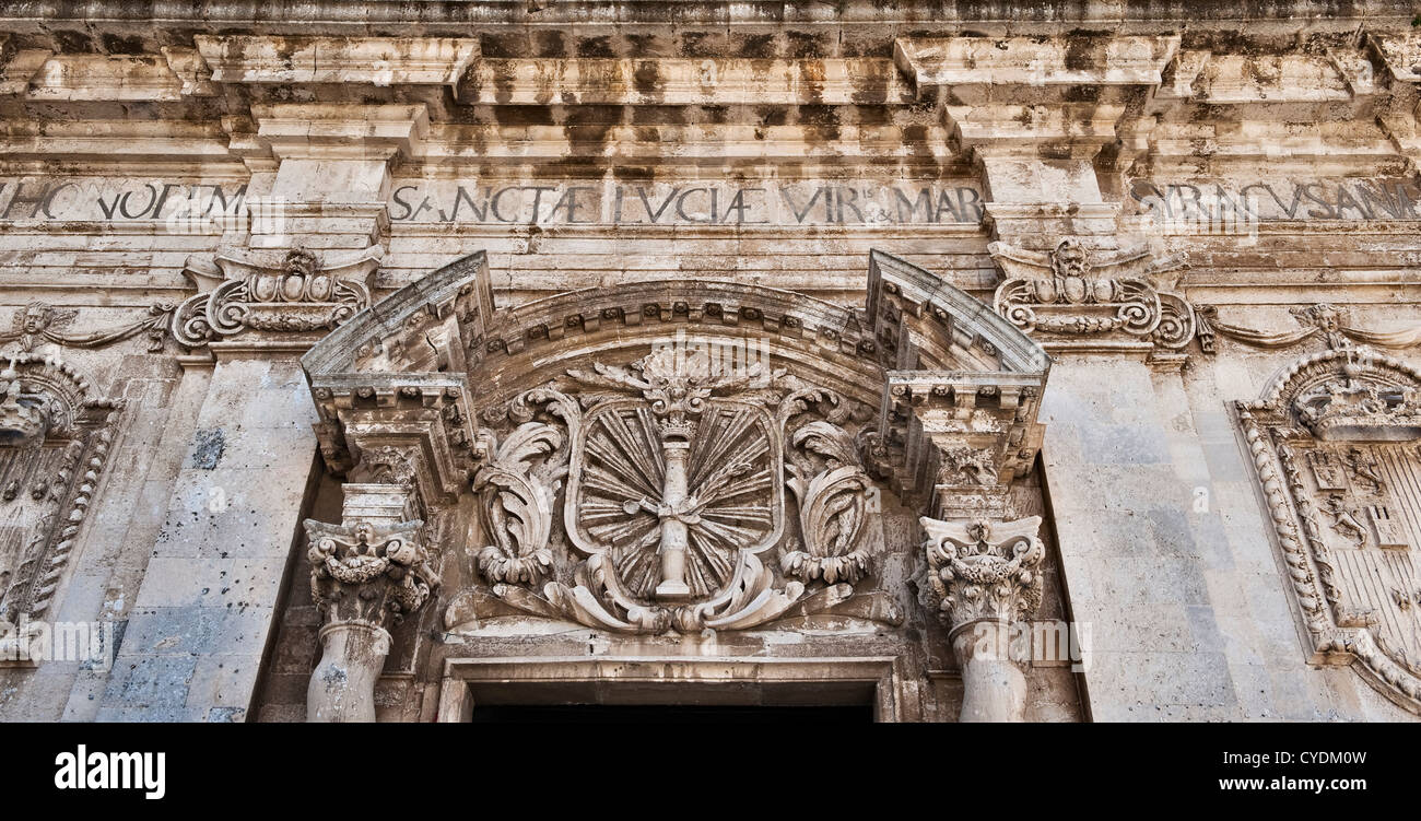 A detail of the Baroque facade of the church of Santa Lucia alla Badia in Ortygia, Siracusa, Sicily, Italy Stock Photo