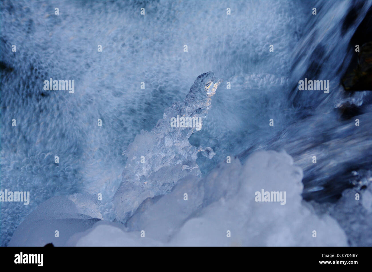 Brook Using Ice a icy waterfall in a small brook Stock Photo - Alamy