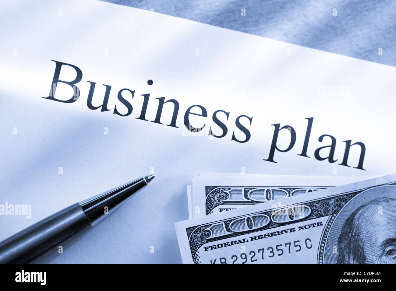 Business plan conception with money Stock Photo