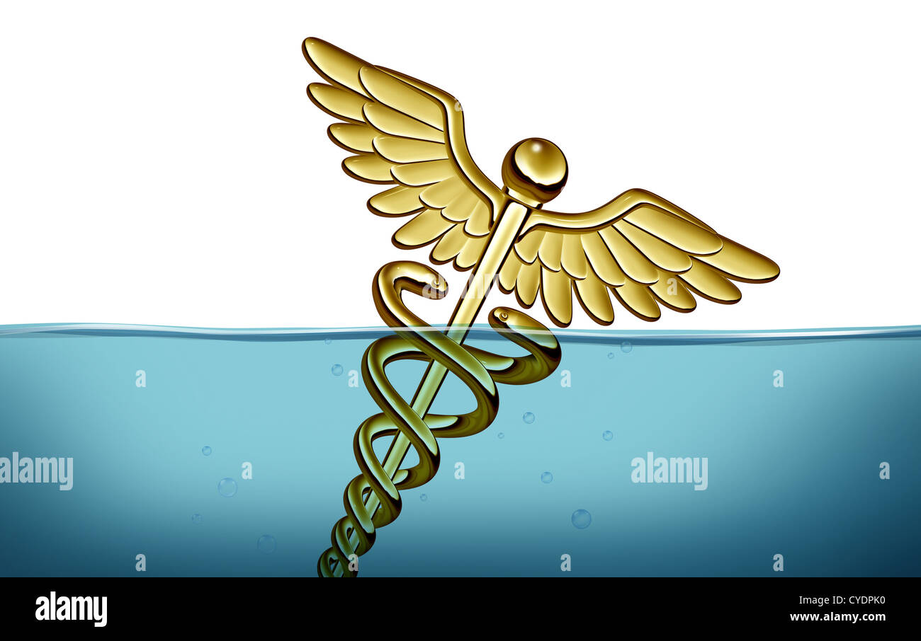 Health care problems and medical crisis with a caduceus symbol drowning and sinking in water as a concept of challenges in fundi Stock Photo