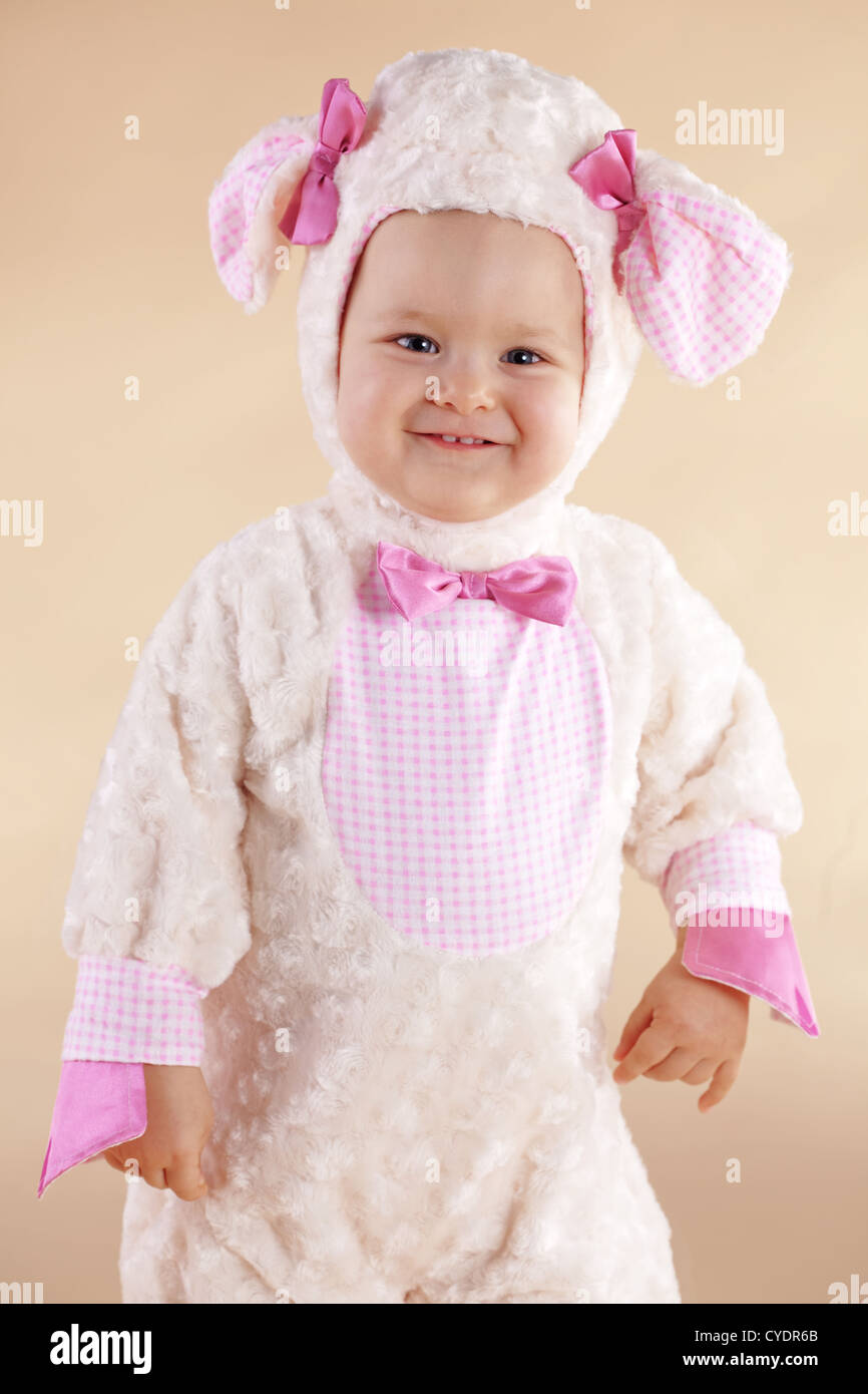 Very cute baby wearing sheep costume Stock Photo - Alamy