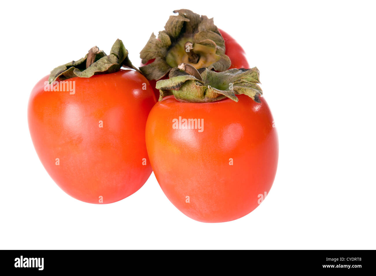 three ripe persimmon isolated on white background Stock Photo - Alamy