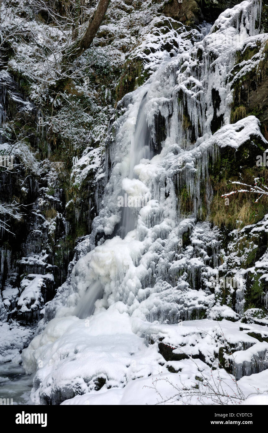 Grey Mares Tail, frozen waterfall in winter snow, Galloway Forest Park