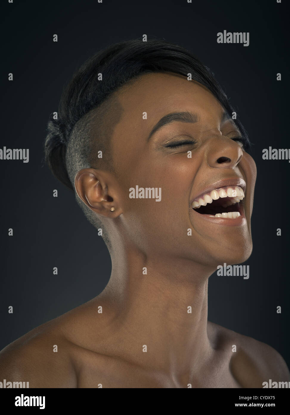 Woman with stylish haircut - head shaved at sides and long hair on top laughing happily Stock Photo - Alamy Woman with stylish haircut - head shaved at sides and long hair on top laughing happily Stock Photo - Alamy