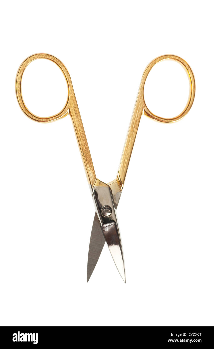 Manicure scissors with golden color handles isolated over the white Stock Photo