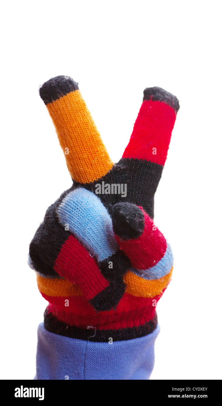Childs hand in glove with two fingers victory gesture Stock Photo Alamy