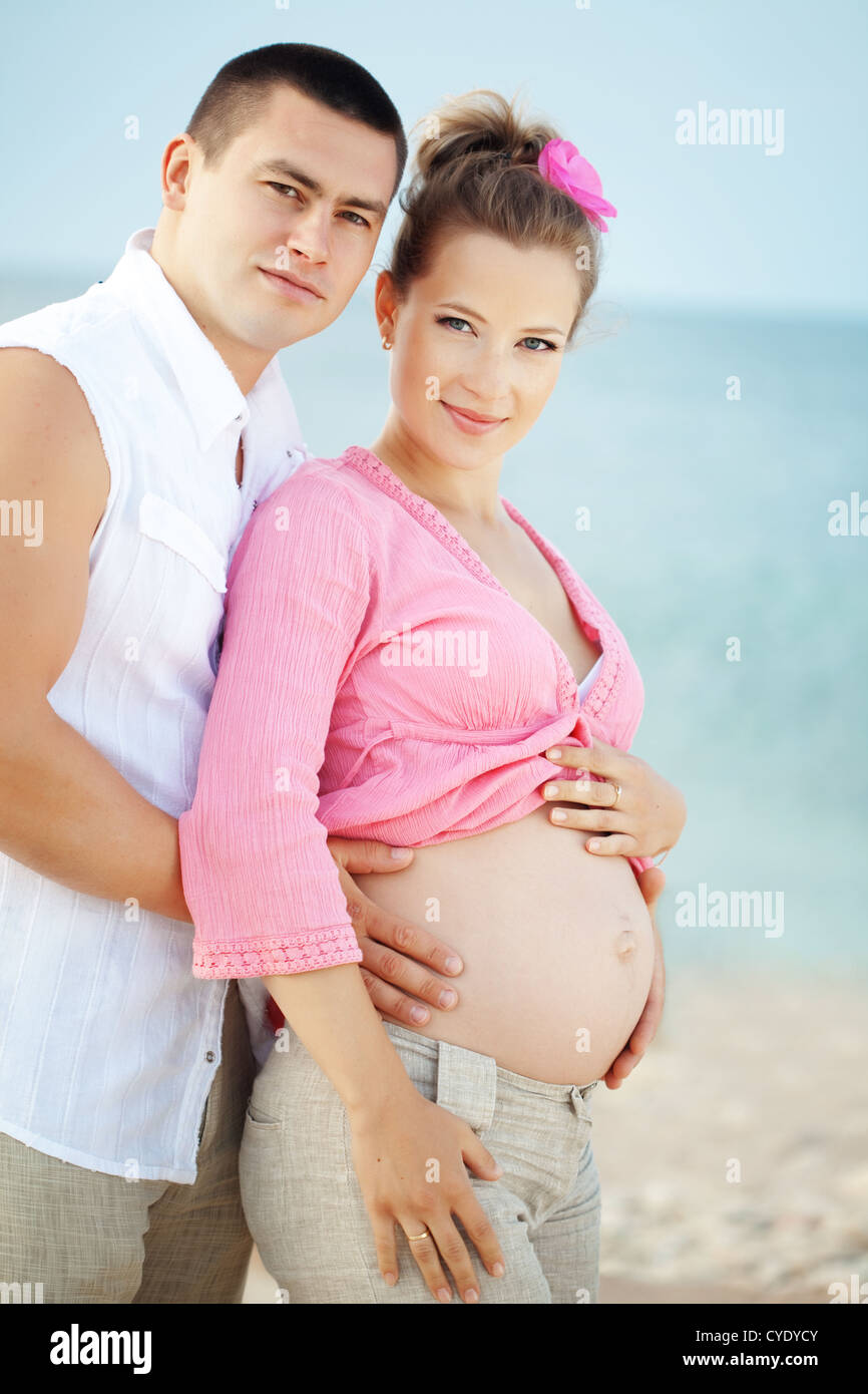 Portrait of beautiful loving couple awaiting baby Stock Photo - Alamy