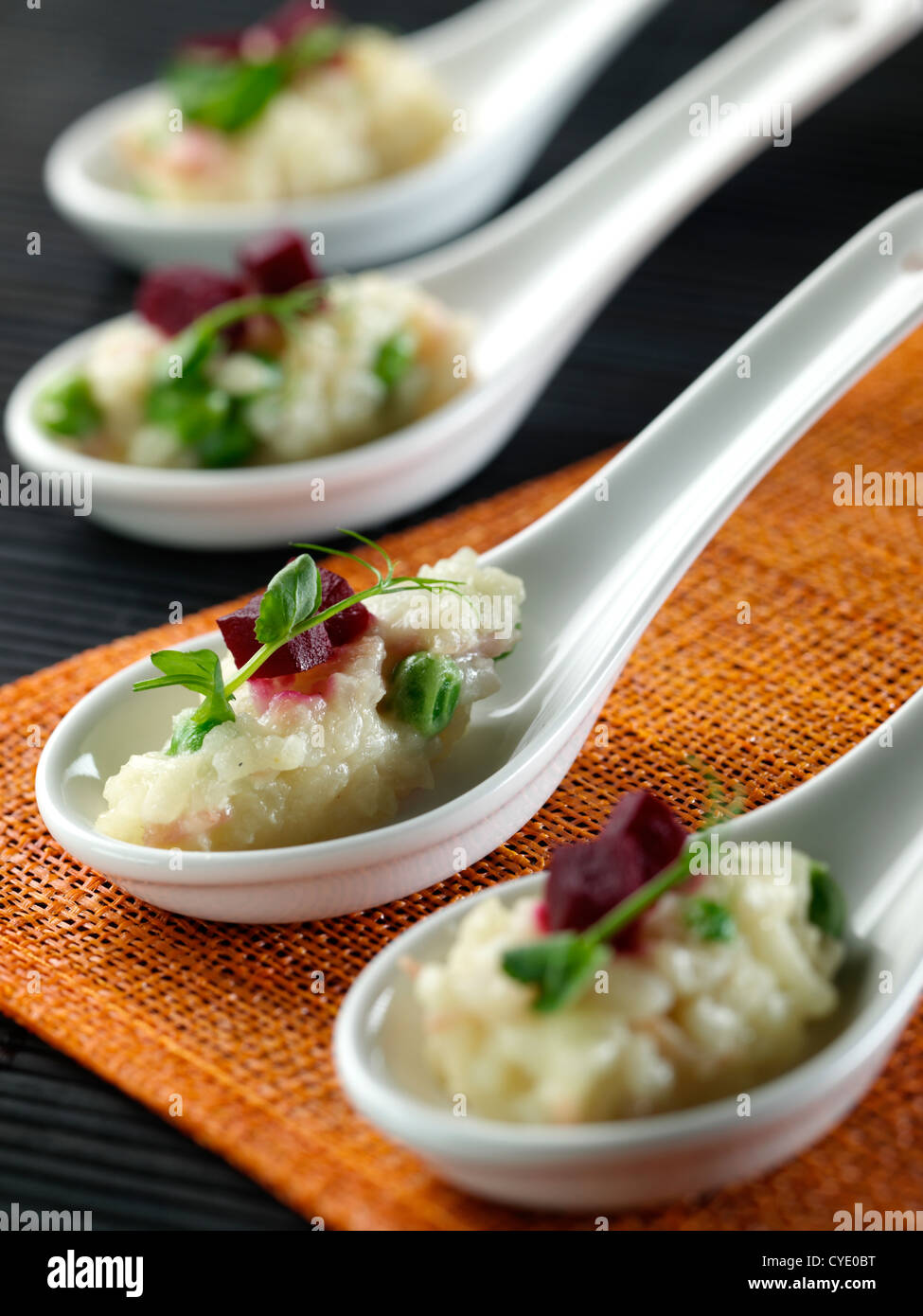 Ham and pea Risotto in Chinese spoons Stock Photo Alamy