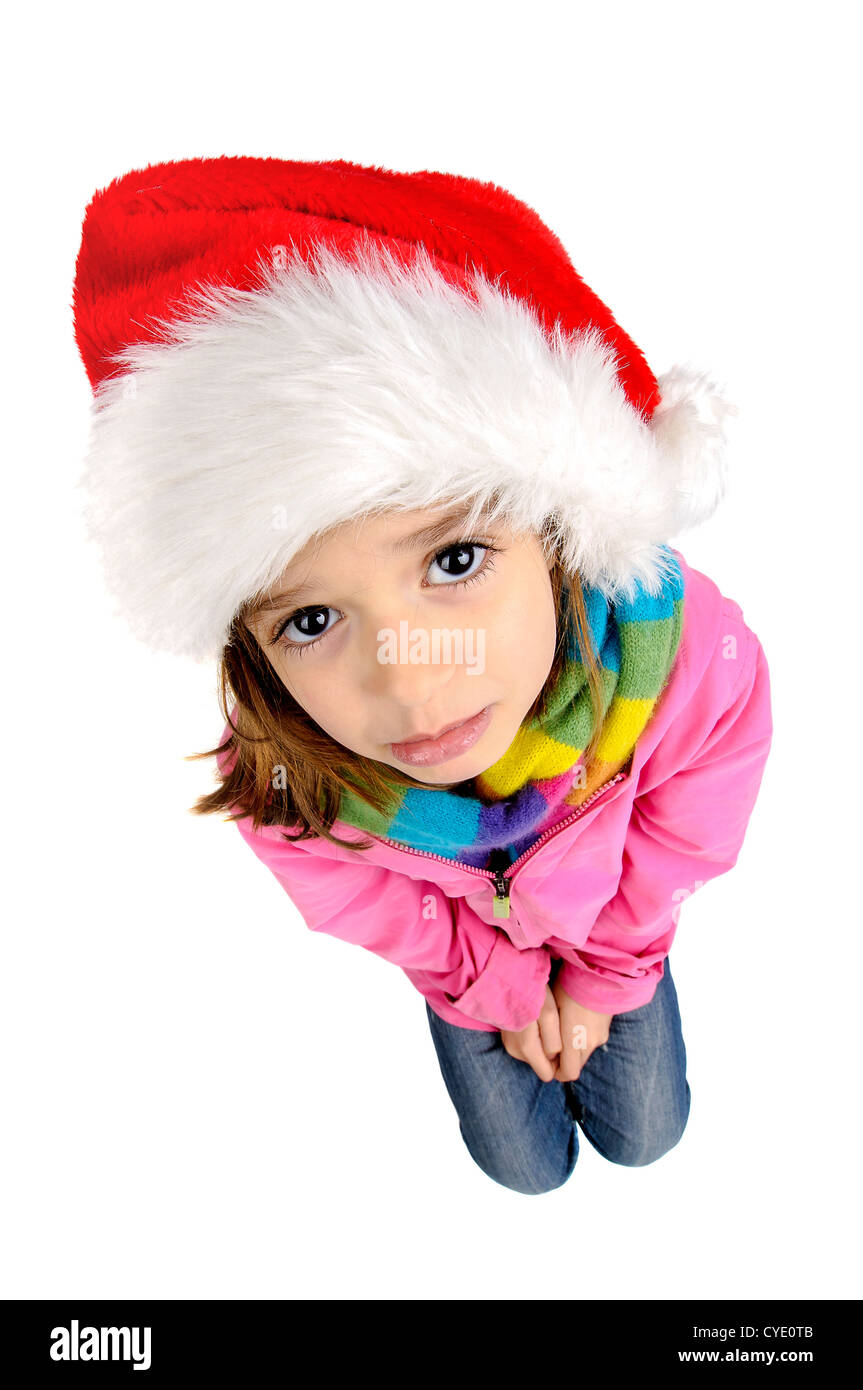 Young girl with Santa's red hat and a sweet sad face Stock Photo