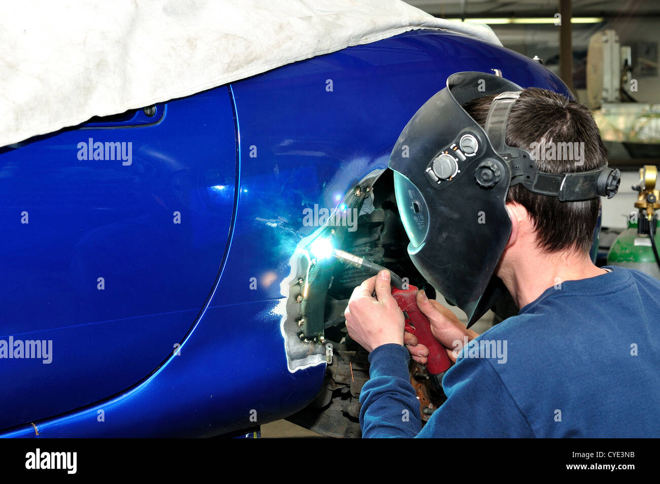 Welding the car body hires stock photography and images Alamy