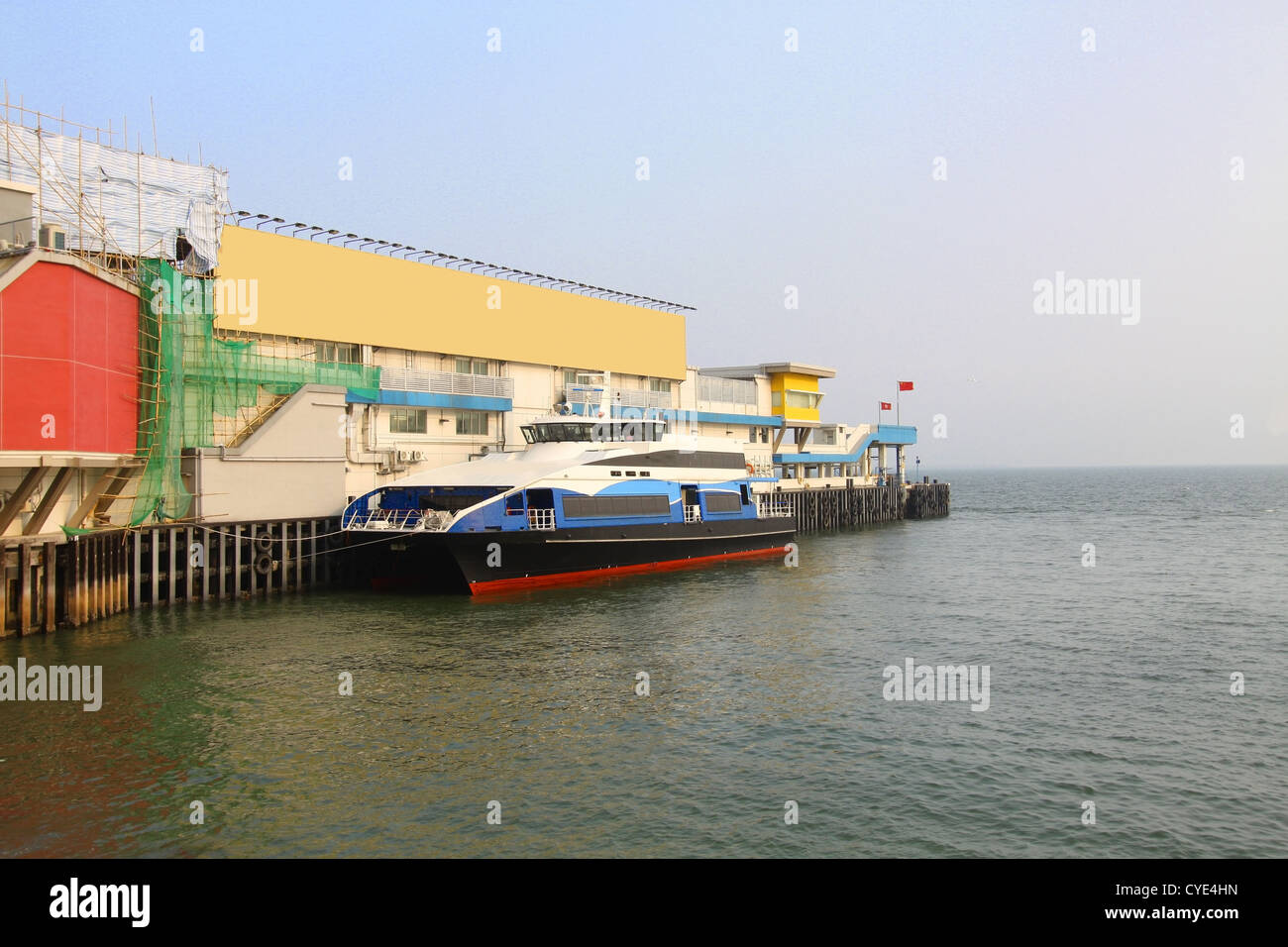Ferry pier with ship to Macau Stock Photo